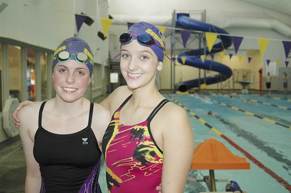 Sequim High School seniors and swim teammates Jessica Craig and team captain Victoria Fitzpatrick practice at SARC the day before the facility is set to temporarily close. Relying on $7