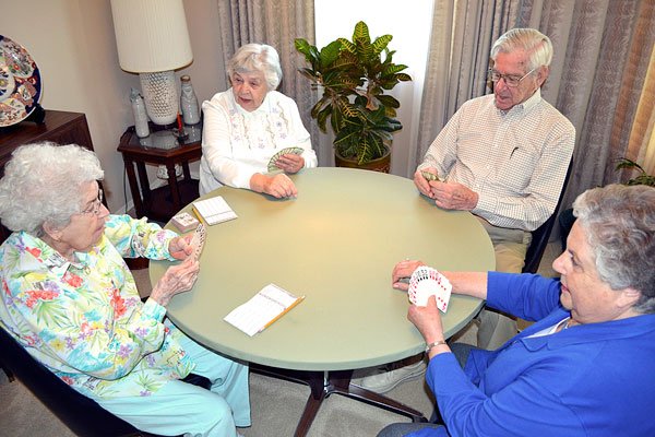 Card group keeps dealing for charity