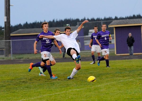 Cameron Chase goes for a late goal against North Kitsap on April 28 in Sequim.