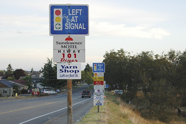 City officials purchased background signs to make the motorist information signs along the South Sequim Avenue exit more attractive and conform to state requirements. Mimicking the Clallam County fee structure