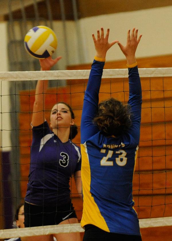 Sequim junior Maddie Potts slams down a point against the Bremerton Knights on Oct. 26.