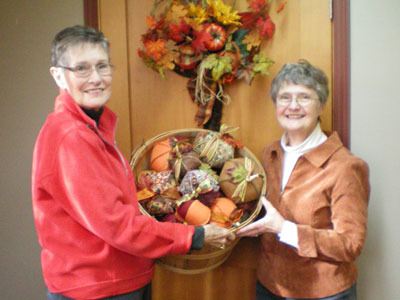 Members made hundreds of festive pumpkins for the PEO  bazaar set for Nov. 7