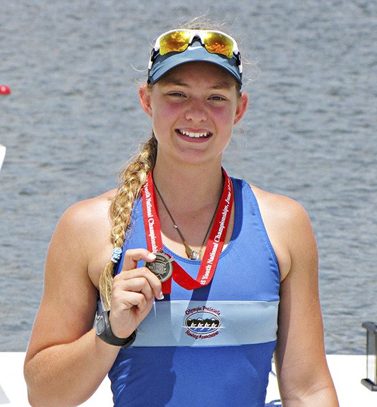 Sequim’s Elise Beuke shows off her silver medal from the 2015 Youth National Rowing Championships.