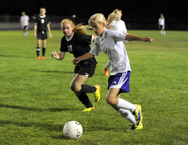 Claire Henninger drives late into the game against the undefeated Klahowya Eagles.