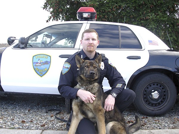 Sgt. Mike Hill with the Sequim Police Department and Chase the Dog have worked together to arrest more than 100 criminals and track at least 90 suspects since 2008. The Sequim Police Department seeks assistance with Chase's vet bills following a surgery for a possible cancerous mass.