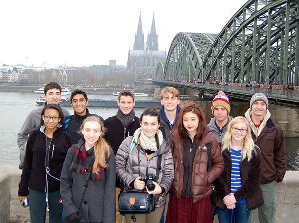 American students visiting Germany see the Rhine River and famous Koeln (Cologne) Cathedral in the background. Katherine Landoni of Sequim is in the front row
