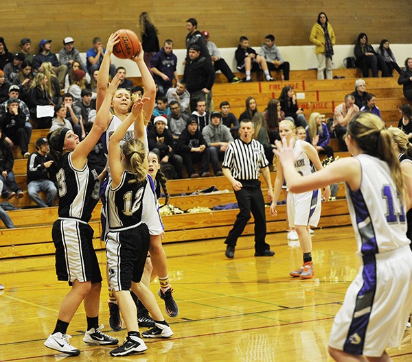Elise Beuke grabs one of her 12 offensive rebounds on Dec. 5. She and Kylee Williams had 15 boards each.