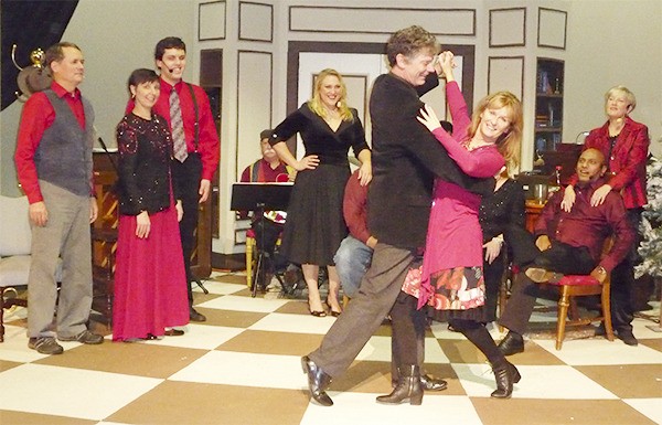 Dancers Jeff Stauffer and Carol Hathaway engage in fancy footwork as the rest of the cast joins in the party. From left are Joel Yelland