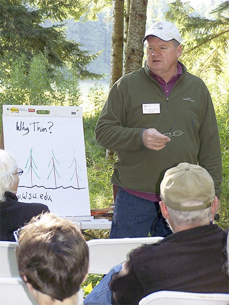 WSU Extension Forester Arno Bergstrom discusses tree thinning best practices at a recent “field day.”