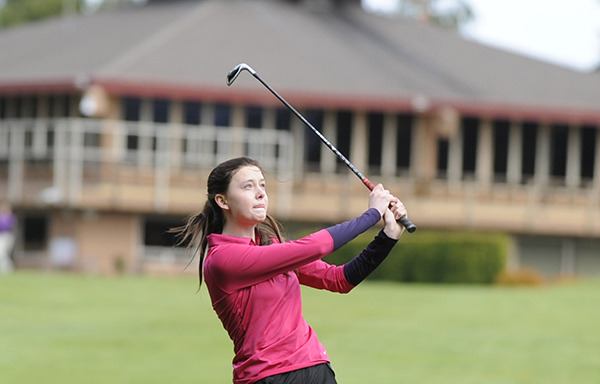 Sequim High freshman Alex McMenamin drives her second shot toward the first hole at The Cedars at Dungeness on April 23. McMenamin edged Port Angeles’ Dana Fox for Most Valuable Player honors in the Olympic League this spring.