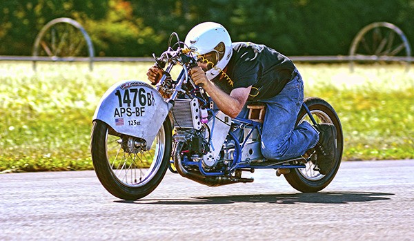 George McMurray tests his motorcycle at Sequim Valley Airport.