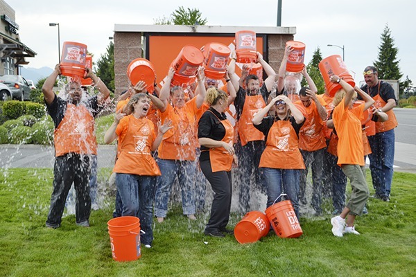 Sequim Home Depot staff pour ice water on themselves on Aug. 18 to challenge other stores in its district to do the same or donate to the ALS Foundation to research a cure and treatment for Lou Gehrig's disease.