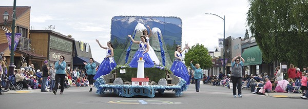 The Sequim Irrigation Festival float makes its way down Washington Street during the Grand Parade Saturday afternoon.