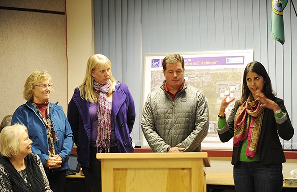 Accepting a grant from the Sequim Education Foundation are (second from left) Sequim Middle School teachers Debbie Quinnell