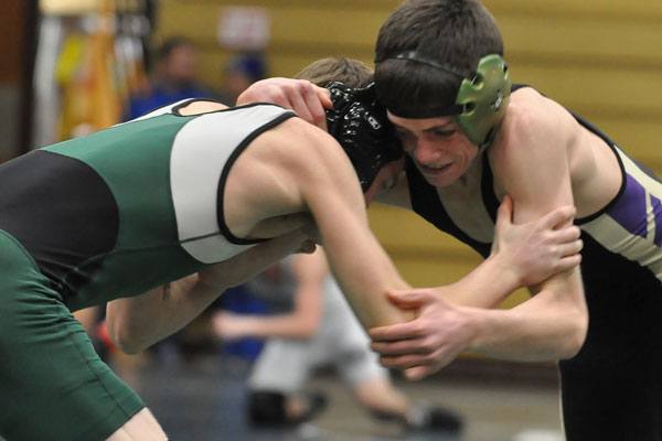 Wrestling: Three girls move on to districts, boys fall
