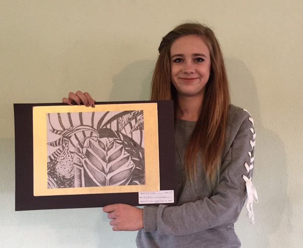Ava Keehn of Sequim displays her graphite drawing “Le Jardin