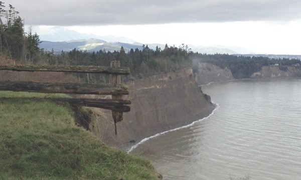 The view from Chris Saari's property and overhanging fence following a landslide event.