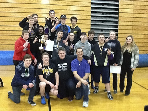 Sequim wrestlers celebrate a second-place finish at the Island Invitational on Jan. 9