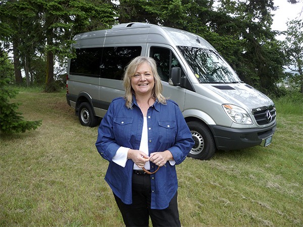 Soon Linda Barnfather’s touring van will sport the company logo of Olympic Peninsula Adventures.