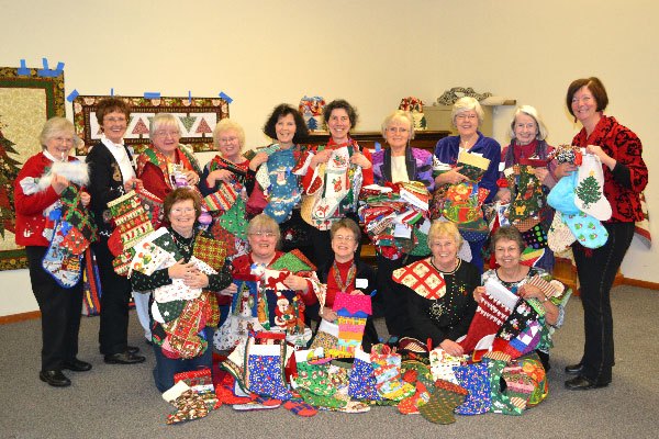 Quilters stitch support for foster families