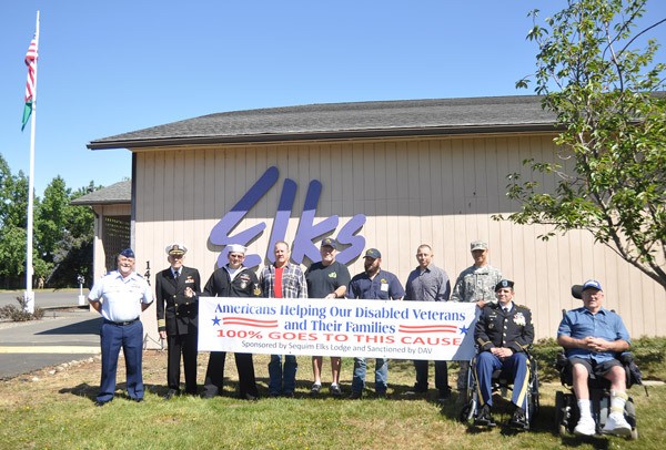Showing their support for a Fourth of July fundraiser at the Sequim Elks Lodge 2642 on May 11 are