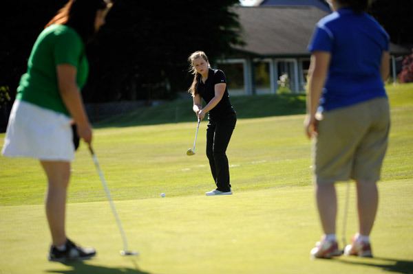 Sequim's Sarah Shea putts her way to a state berth on May 10 at the Olympic League Golf Championships. She shot a 91 to tie for fifth overall.