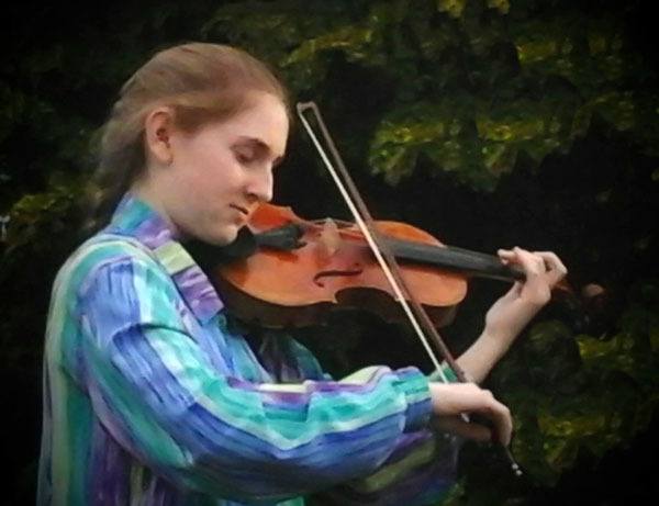 Kate Powers continues playing violin five years after beginning and has developed quite a following