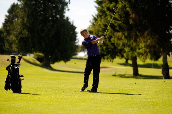 Sophomore Josiah Carter looks to stay on the green during the Olympic League Golf Championships on May 10 at the Cedars at Dungeness. He placed 22nd at disricts on May 17 in Bremerton but went in as the No. 1 seed from the league tournament.