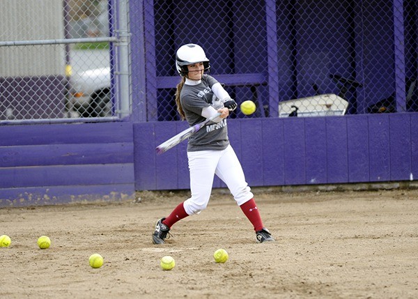 Emily Copeland hits a line drive during a recent batting practice.
