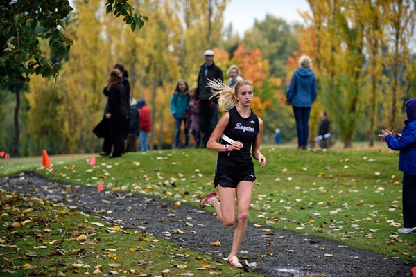 Sequim’s Audrey Shingleton races to a fourth place finish as the Wolves sweep Port Angeles and Port Townsend in an Olympic League showdown on Oct. 7 in Port Townsend.