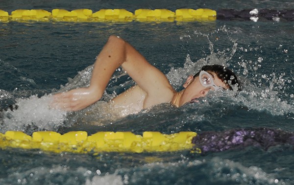 Adrian Gonzales swims the second leg of the 200-meter relay as Sequim takes on Olympic on Dec. 18.