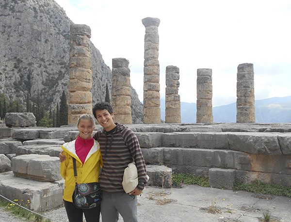 Ady Crosby and Neddy Dondup stand in front of the Temple of Apollo at the ancient Delphi site.
