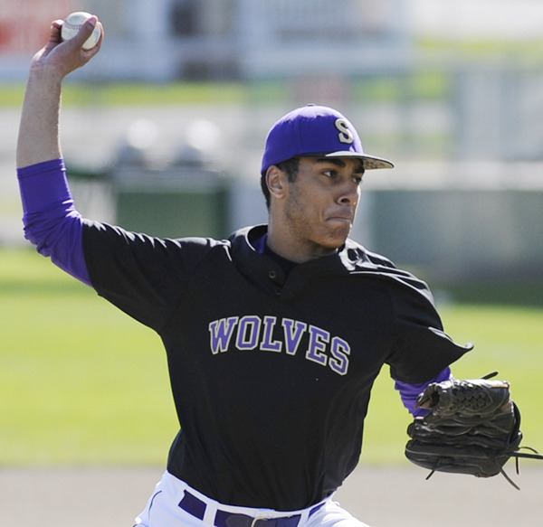 Sequim's Nigel Christian pitches against Port Angeles on April 11