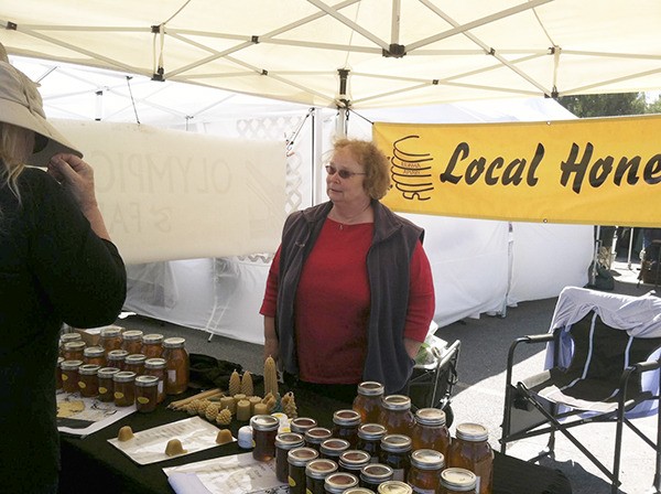 Elwha Apiary’s Sam and Dave Crossley bring some sweetness — in the form on honey — to the Sequim Farmers Market each week.