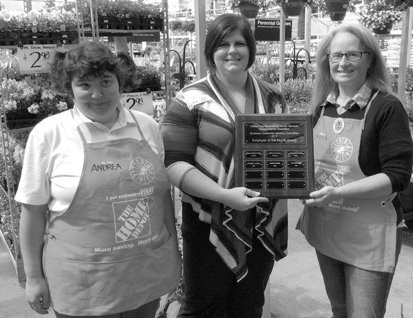 From left are The Home Depot employee Andrea Reise