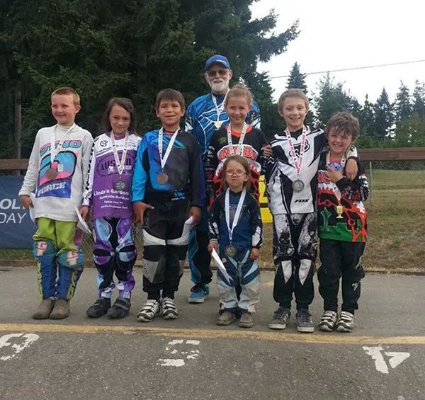 Port Angeles BMX riders receive awards for being the the top donators at the Race for Life event on July 5. They include (from left) Rily Pippin (fifth place