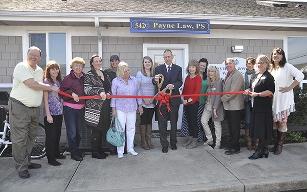 Members of the Sequim-Dungeness Valley Chamber of Commerce celebrate the new location of Payne Law Firm at 542 N. Fifth Ave.