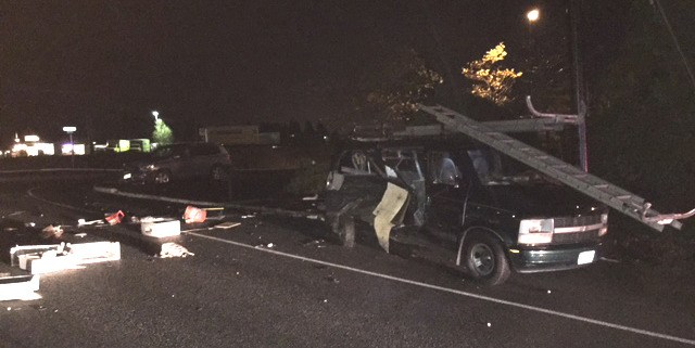 A two-vehicle collision on Deer Park Road leaves debris scattered on the roadway Nov. 16.