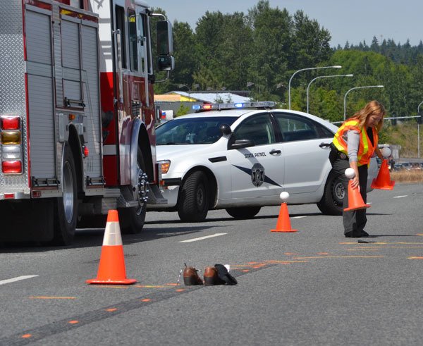 A 69-year-old Sequim woman was killed while crossing the highway in Carlsborg on Thursday morning.