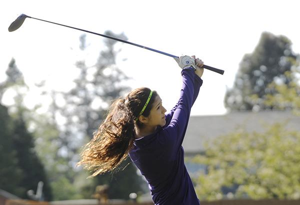 Sequim’s Angela Carrillo-Burge hits a drive on hole No. 2 at The Cedars at Dungeness on April 21. Sequim’s girls out-shot the Olympic Trojans by 25 strokes.