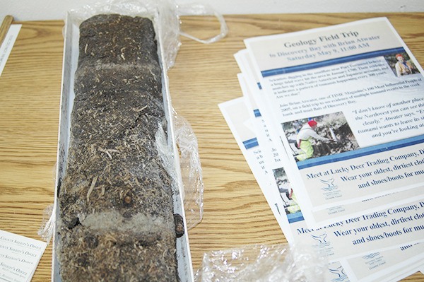 A core sample from Discovery Bay shows the distinct layers of ocean sediment deposited in the area’s salt marshes during past tsunamis. Similar evidence of historic natural disasters can be seen first-hand during a field trip with U.S. Geological Survey geologist Brian Atwater