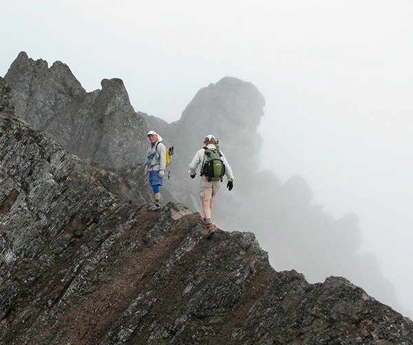 John Bridge and hiking company make their way along the Mount Angeles Traverse. Bridge presents the third of the 'Outdoor Fanatics' series on May 7.