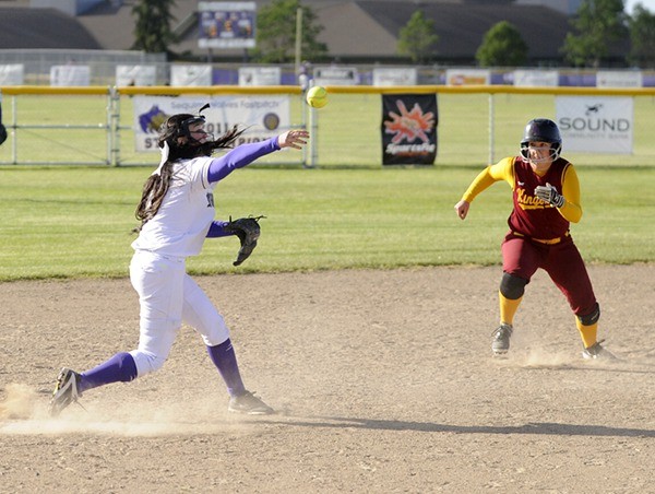 Sequim shortstop Jordan Bentz makes a play to first against Kingston to help the Wolves prevent a run. Sequim topped Kingston 7-4 on April 29.