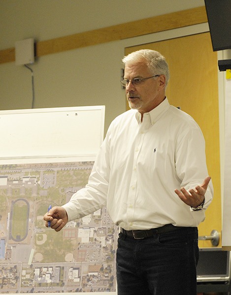 Sequim schools superintendent Gary Neal discusses plans for a $55 million bond with board directors at the Sequim Transit Center on July 27.