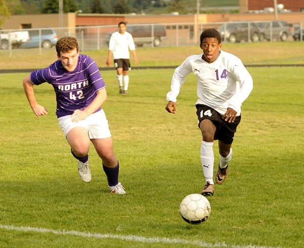 Sequim’s Josiah Urquia advances the ball up field on April 28. His pass later on set up Sequim’s only goal by Liam Harris in the 1-0 win over North Kitsap.