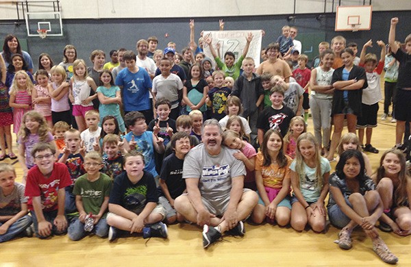 B&G Club campers celebrate unit director Dave Miller’s birthday.