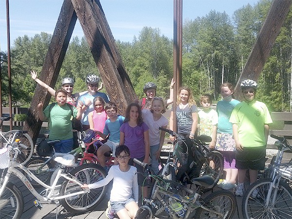 Campers at the Dungeness River Audubon Centers first Summer Science camp are ready to ride the 7 miles from Railroad River Bridge to Carrie Blake Park.