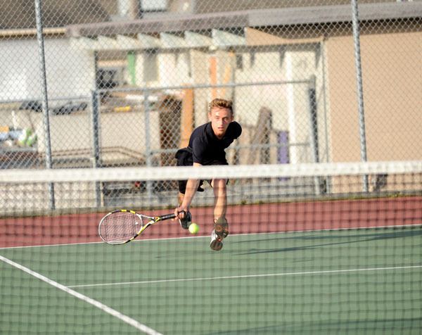 Matthew Richards returns a hit in the last match of the season on Oct. 14. He’ll be Sequim’s lone representative at districts this week.