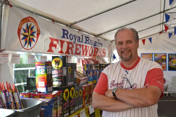 David Westman stands inside the Royal Rangers Fireworks stand.