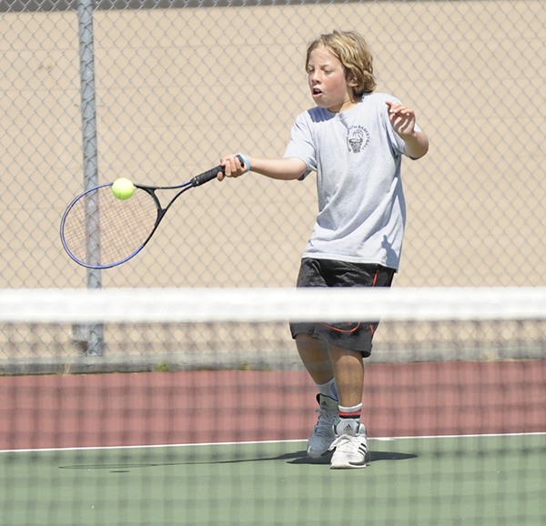 Reef Gelder hits a forehand shot as he takes on Blake Wiker on Aug. 10.